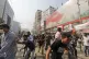 Activists of the Bangladesh Nationalist Party run after clas