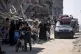 Palestinians displaced by the Israeli air and ground offensi