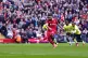 Liverpool's Mohamed Salah scores their side's third goal of 