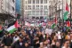 People take part in a Palestine Solidarity Campaign rally in